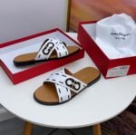 crisscross Feragamo leather slides