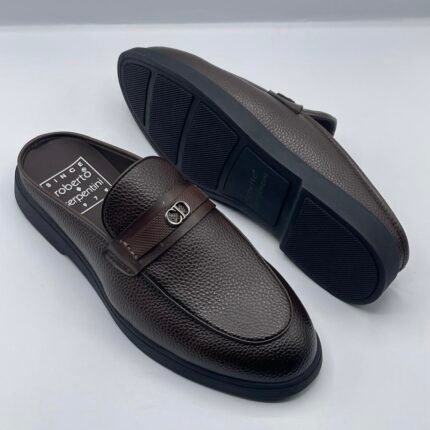 Roberto Serpentini Pebble Leather Mules, a luxurious and modern twist on traditional Italian loafers. Coffee brown