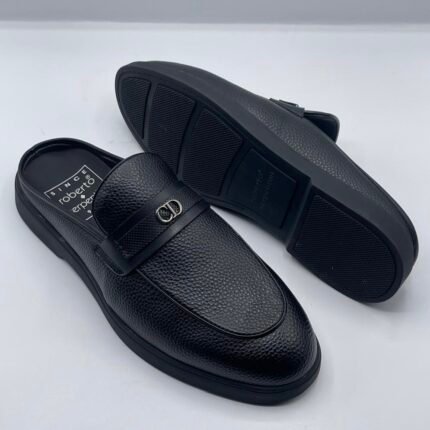 Roberto Serpentini Pebble Leather Mules, a luxurious and modern twist on traditional Italian loafers.