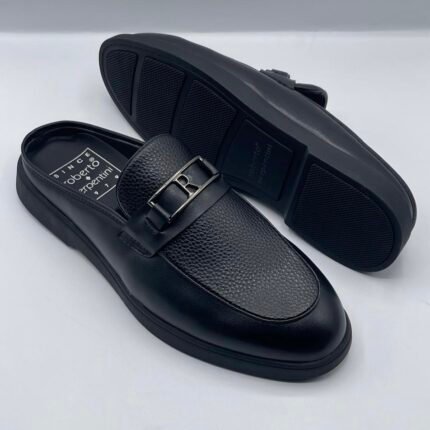 Roberto Serpentini Pebble Leather Mules, a luxurious and modern twist on traditional Italian loafers. Coffee brown